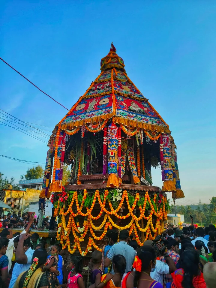 Rathotsavam chariot procession with devotees pulling the ratham